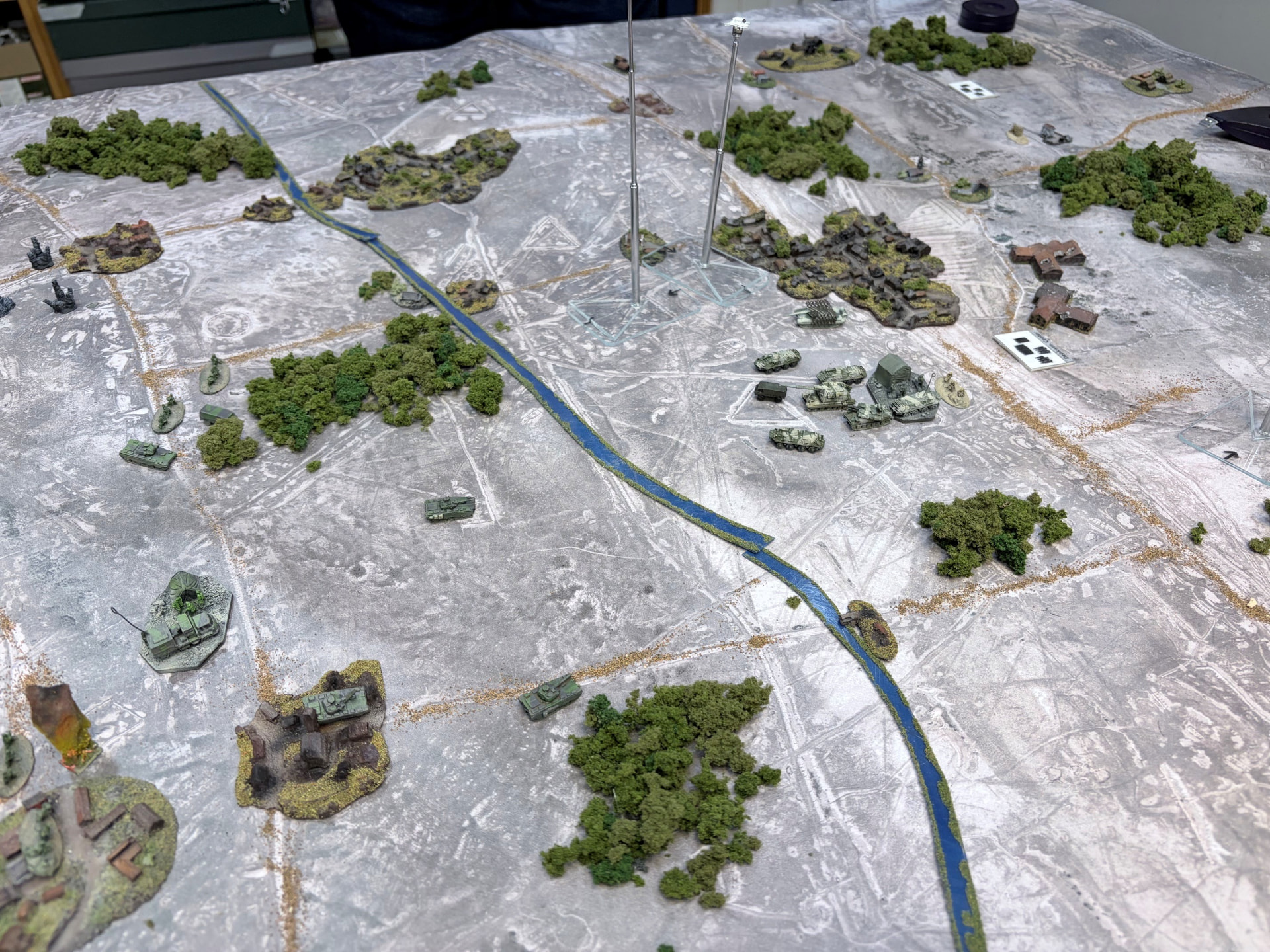 Full Operations table: armour spread on both sides of a canal with drone flight stands overhead