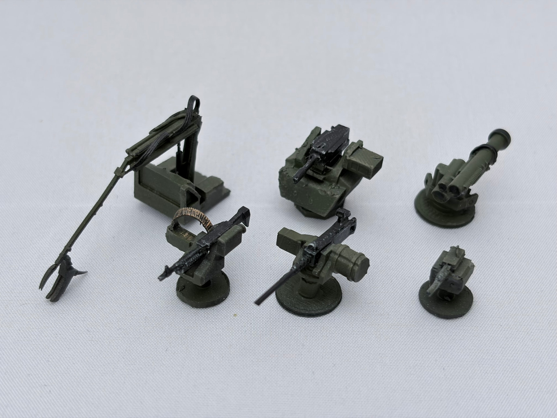 Printed remote weapon stations, launcher mounts and an articulated manipulator arm