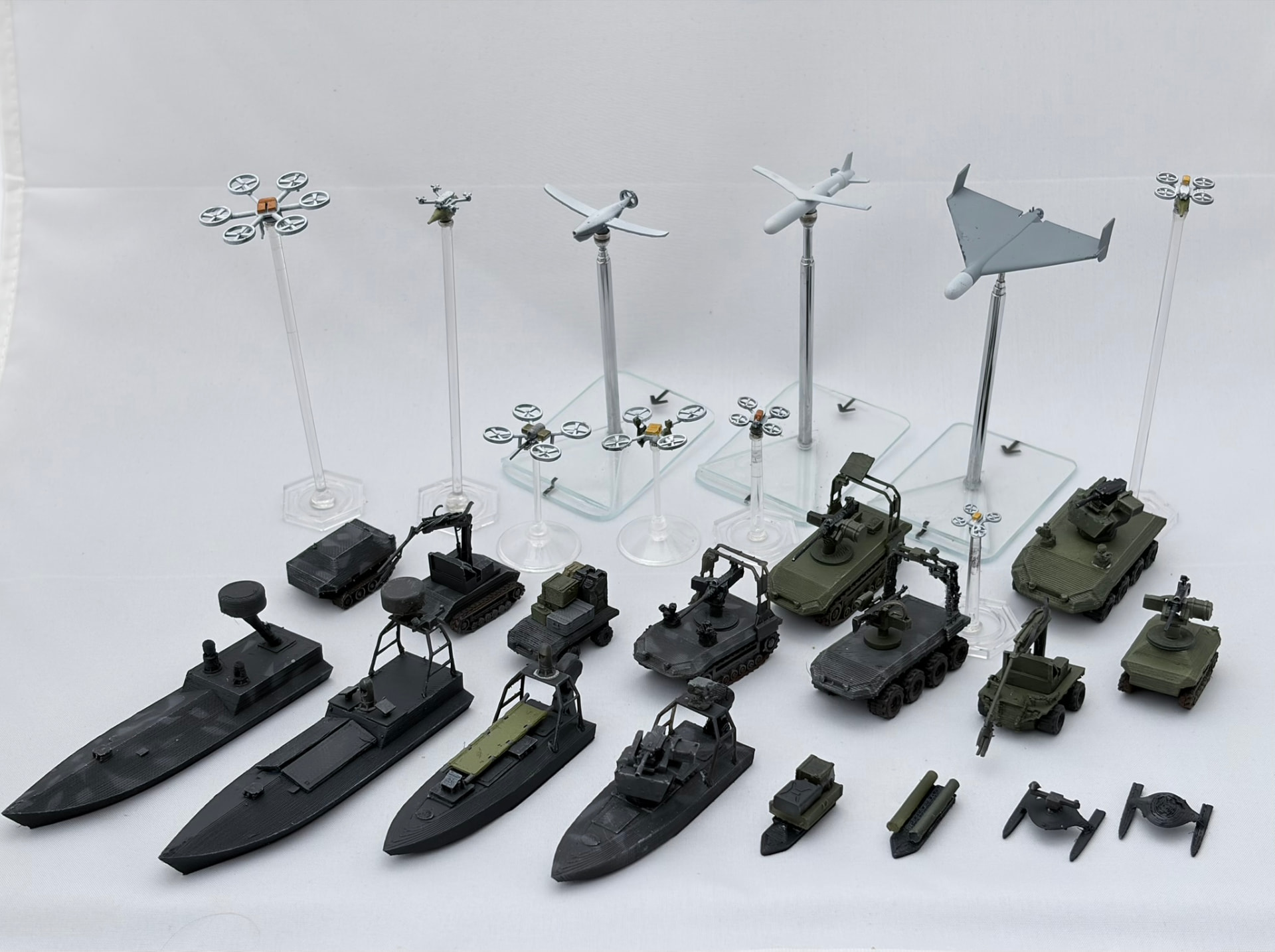 The complete printed Drone Front collection: aerial drones on flight stands, ground drones and surface vessels